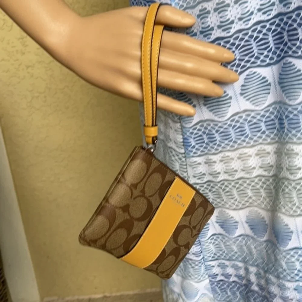 COACH Signature PVC Leather Corner Zip Wristlet